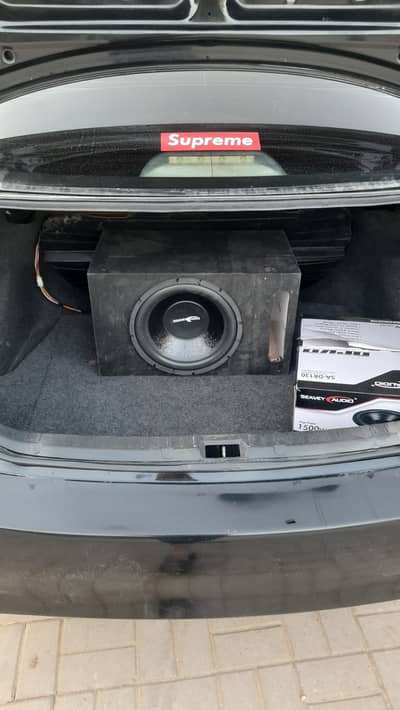 Woofer and amplifier