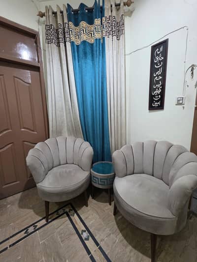 2 chairs with round table set