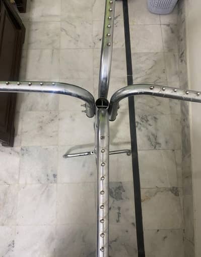 Multi purpose metal hanging stand