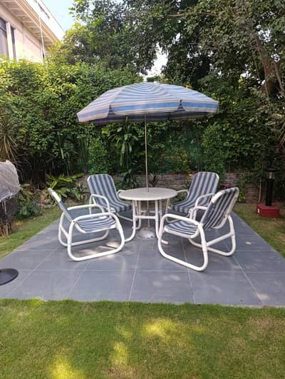 4Lawn chairs n table with umbrella for sale