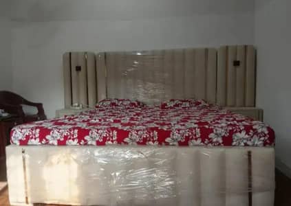 New bed with side table and mattress