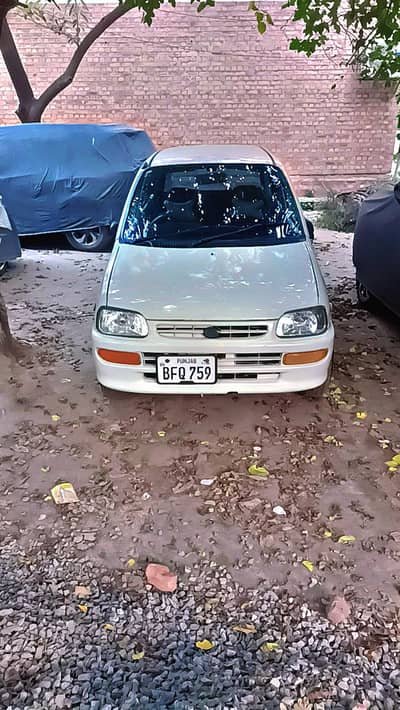 Daihatsu Cuore 2008 automatic transmission,AC,rims,cal 03396446665