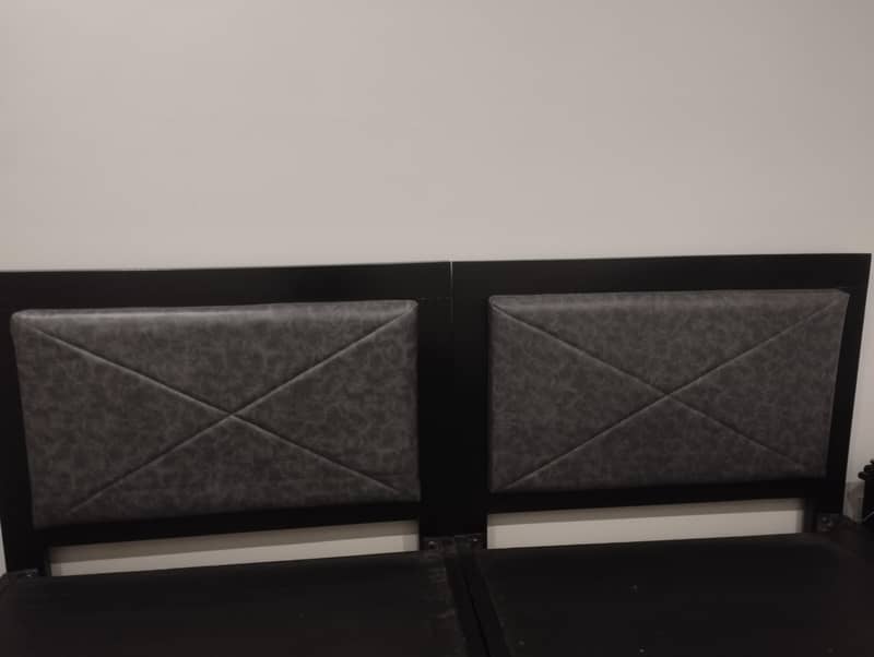 Selling two single solid wood beds 0
