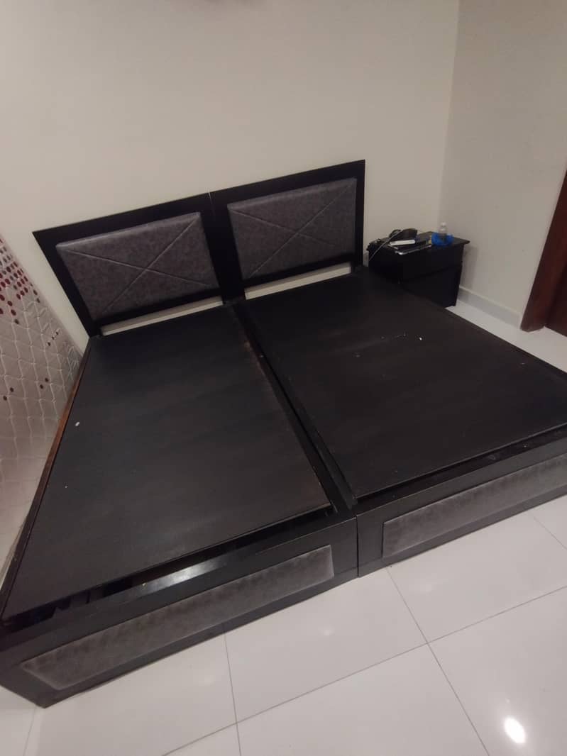Selling two single solid wood beds 4
