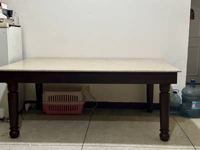 Dining table with marble top