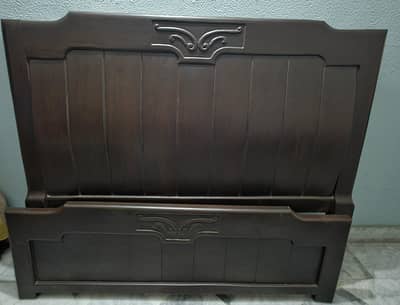solid wood bed with side tables