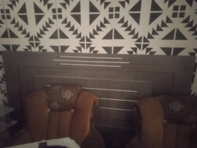 bed and 2door almari