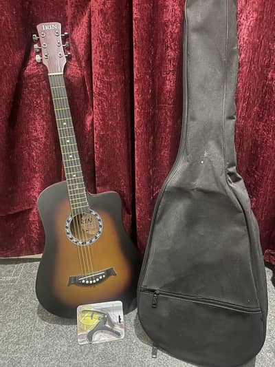 Beginners guitar with bag capo and pics brand new for sale