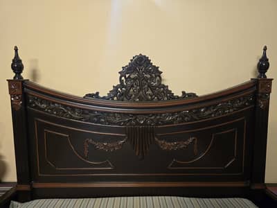 Very carefully used bed and side tables, freshly polished