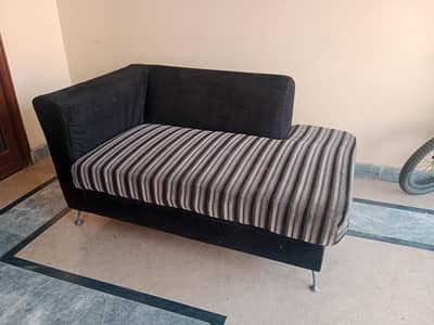 Black and grey two seater sofa