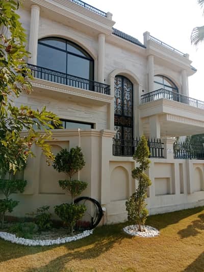 Brand new 1 kanal desnier house with 15 Marla Extra Land with 8 Marla Green belt Available For Rent in reasonable price and prime location Bahria Enclave isalmabad