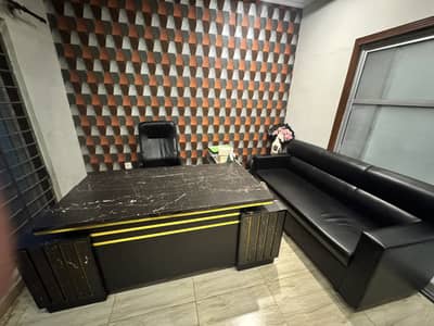 Office table and sofa