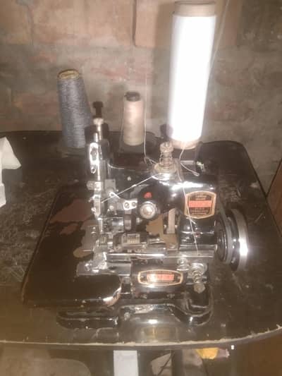 juki machine black mini over lock