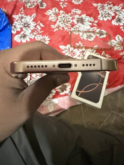 Apple iPhone 16 Pro Max dessert titanium.