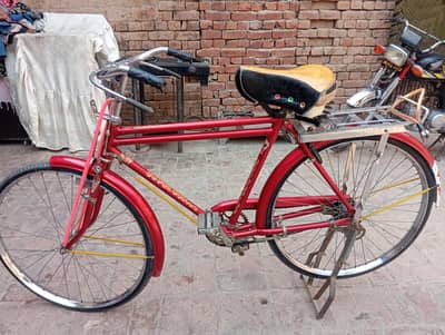 cycle Red colour 10by 10 condition 2 month used