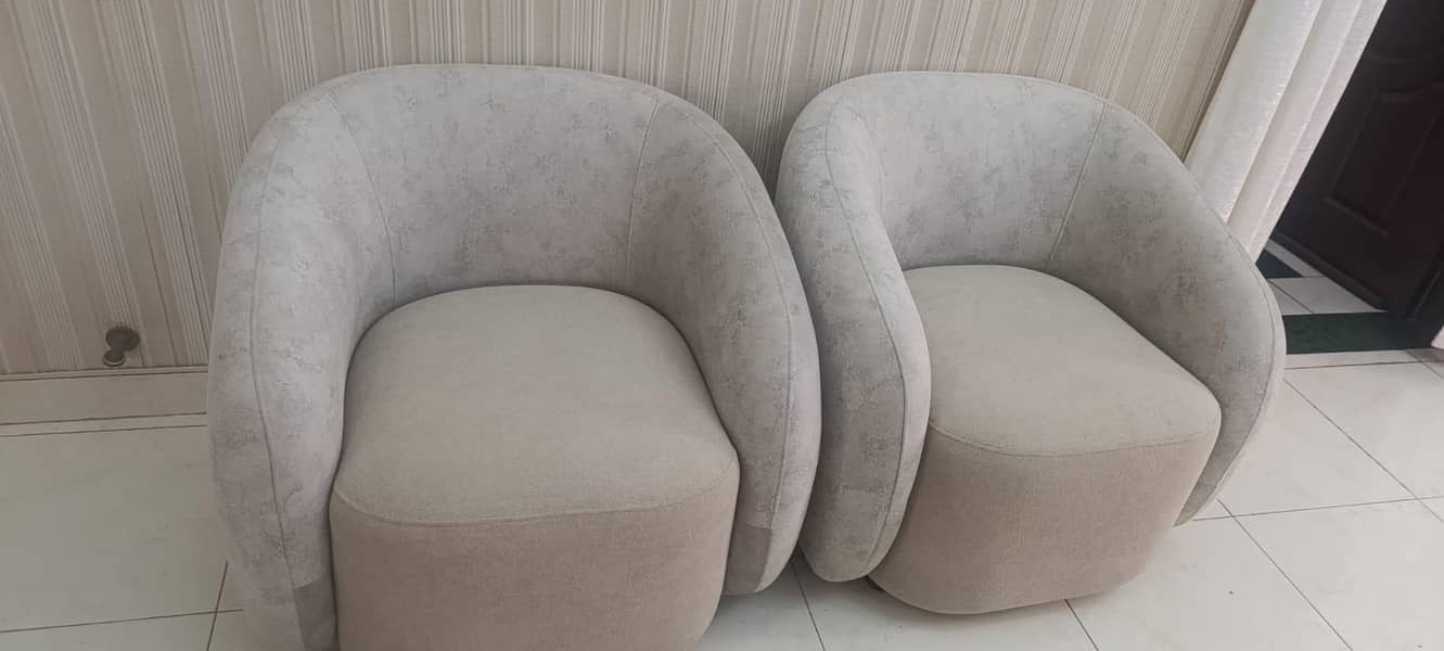 customized L-shaped sofa set and 2 single seater sofas and table 1