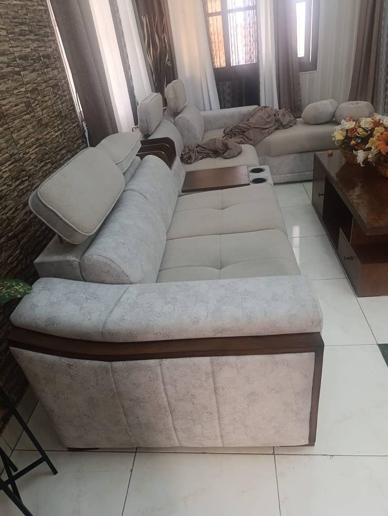 customized L-shaped sofa set and 2 single seater sofas and table 4
