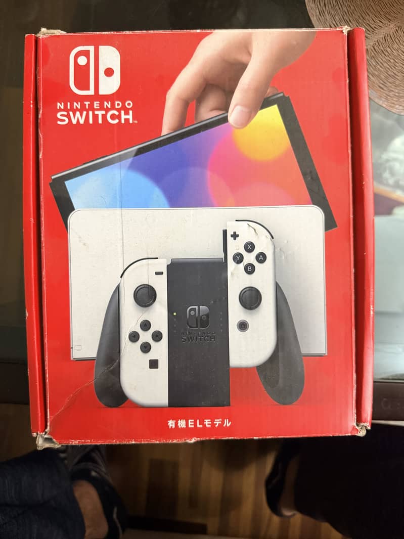 Nintendo Switch Oled  Red blue 0
