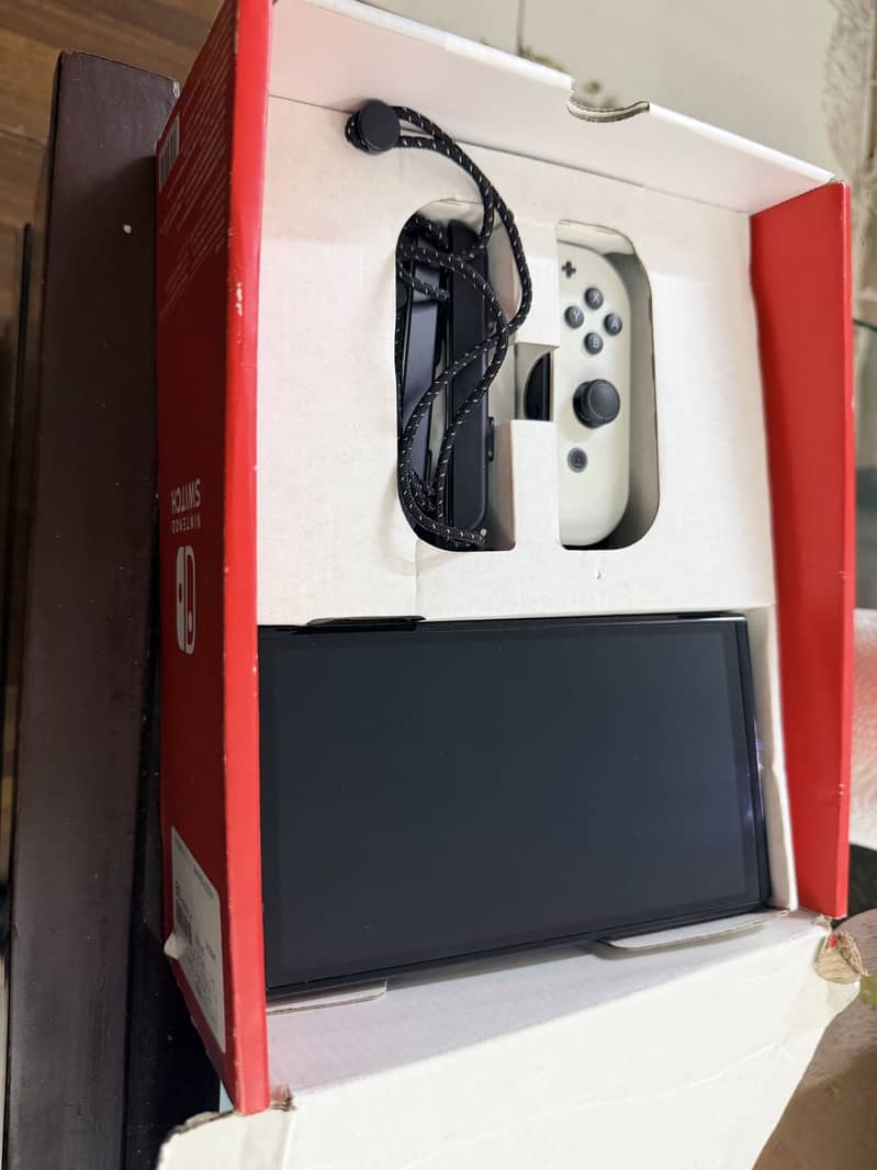 Nintendo Switch Oled  Red blue 1