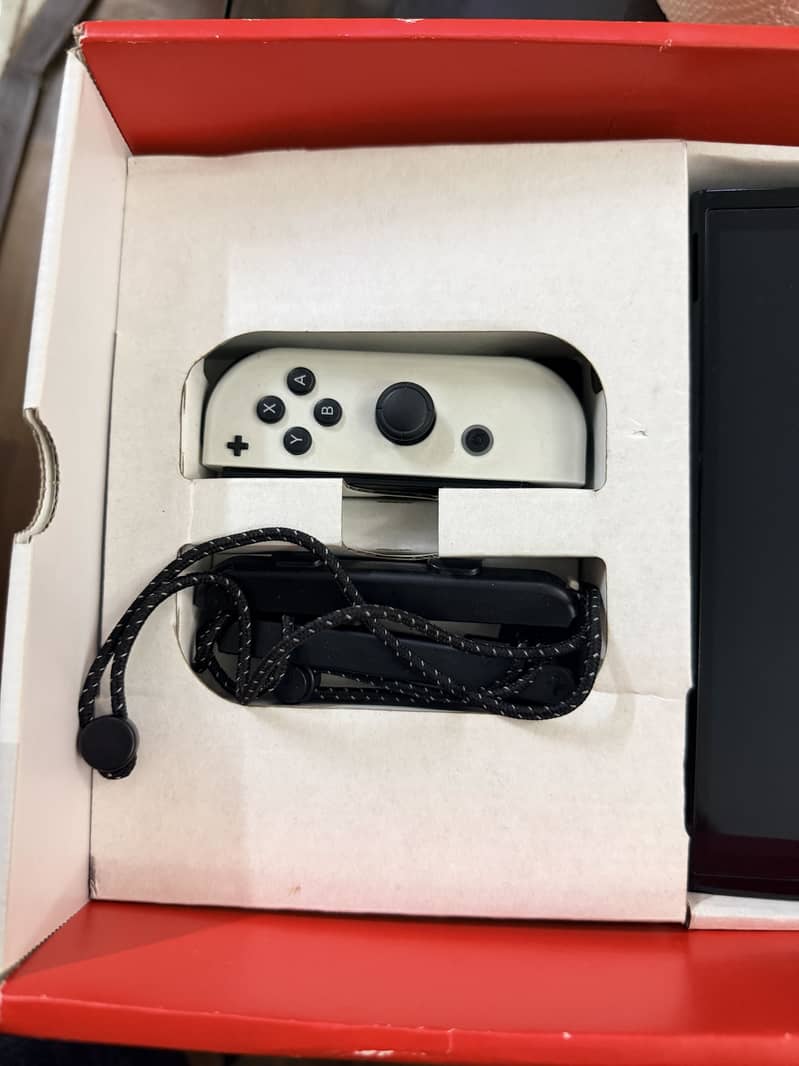 Nintendo Switch Oled  Red blue 2