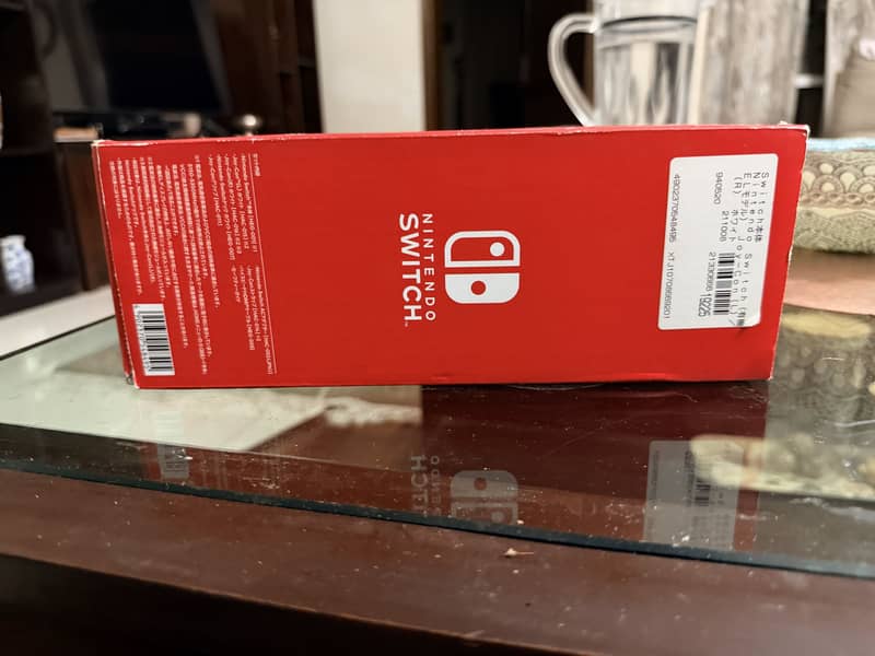 Nintendo Switch Oled  Red blue 3