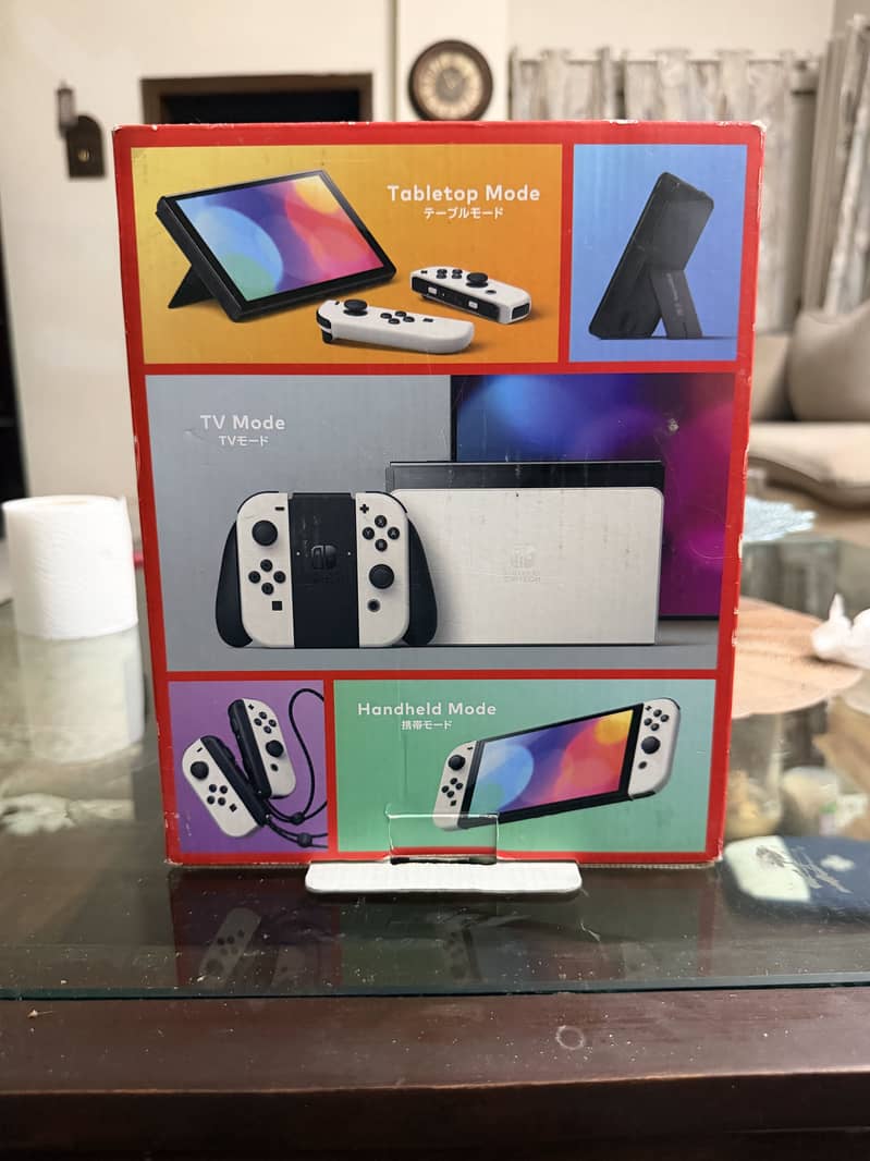 Nintendo Switch Oled  Red blue 4