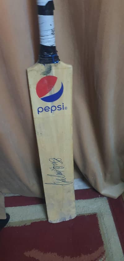 babar azam signed cricket bat produced by pepsi