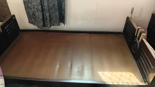 old wooden single bed