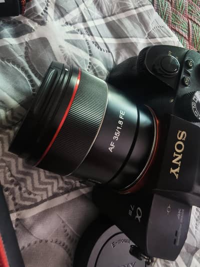 sony a7iii with samyang 35mm f1.8 prime lens orignl bettery charger