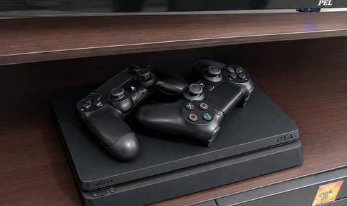 PlayStation 4 Slim 1TB with 2 Controllers and 2 Games