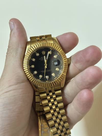 Rolex Oyster Perpetual Datejust - Gold - Black Diamond Dial