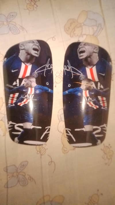 Mbappe blue colour shin guards