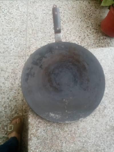 tawa. made  of  iron  look  in. pictures