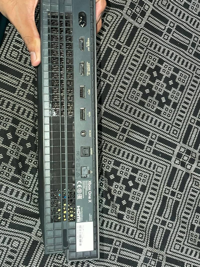 xbox one x 1tb with two controller 6