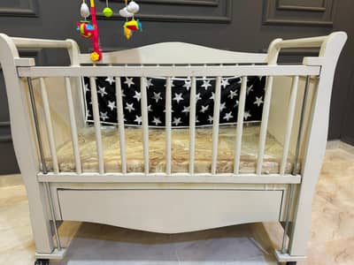 baby cot and strollers