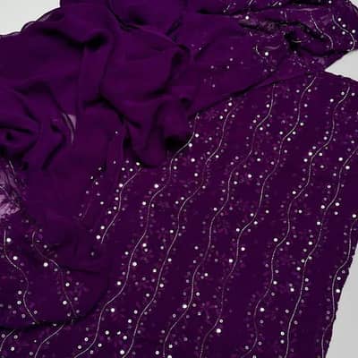 Unstitched suits for party wear
