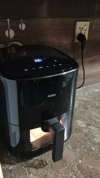 Haier air fryer branded new condition warrenty card available also