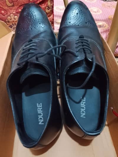 Ndure branded black shoes with box for sale