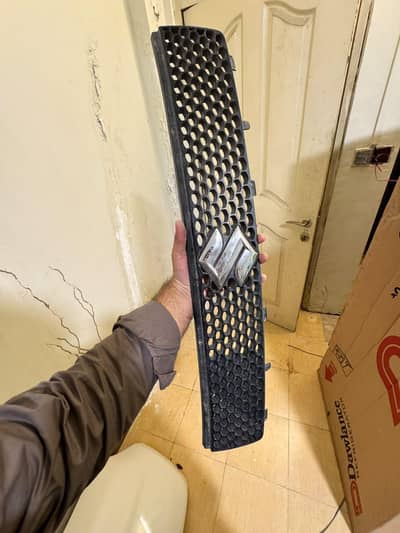 Suzuki Swift Grill + Headlight + Passenger side pillar cover