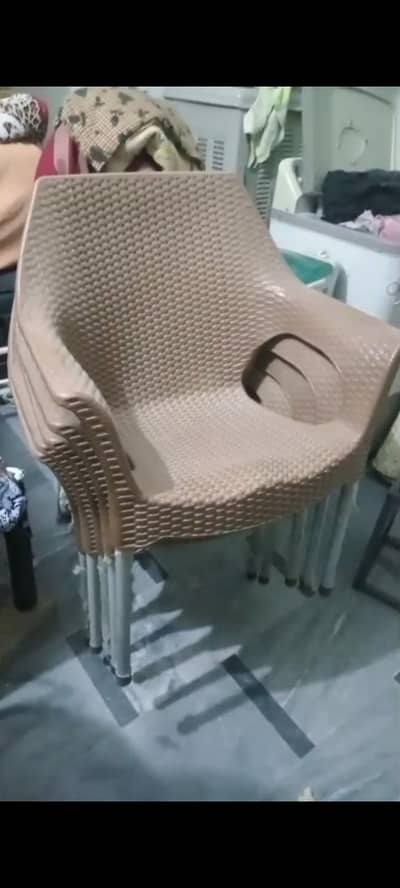 plastic Chairs and one plastic table for sale