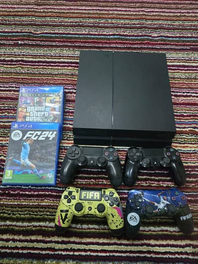 PS4 1TB matte black complete bundle with games and controller.