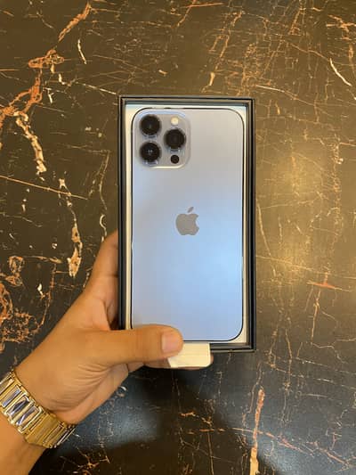 Apple iPhone 13 Pro Max with cable and box