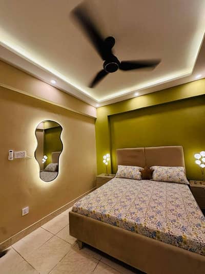 Daily Basis Apartment & Rooms Per day Perweek Short stay Available in E-11 Islamabad