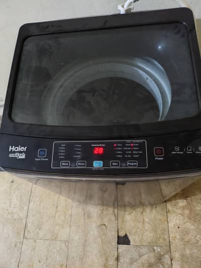 10kg Haier automatic Washing machine few days used warranty card nhi h