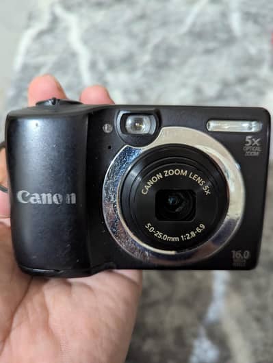 Canon PowerShot A1400 Digital Camera with 4GB Card & Cells