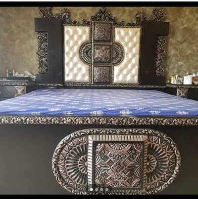 king size bed without mattress. plus two side tables and dressing