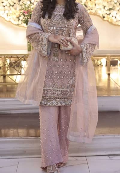 dress with heavy pearls work