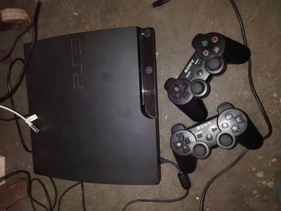 PS3 with 2 Controllers And 19 Games