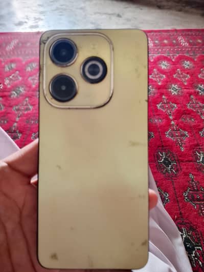 Infinix Hot 40i sirf mobile hai body condition ruff baki all ok hai