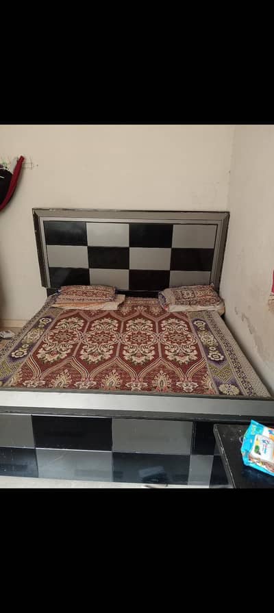 1 bed with two table , 1 dressing table , 1 iron stand , 1 table